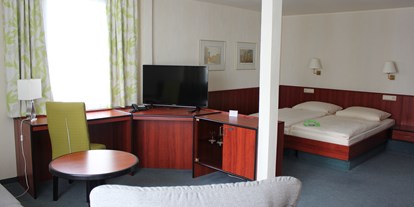 Rollstuhlgerechte Unterkunft - Unterkunftsart: Hotel - Dransfeld - rollstuhlgerechtes Superior Doppelzimmer - Waldhotel Schäferberg