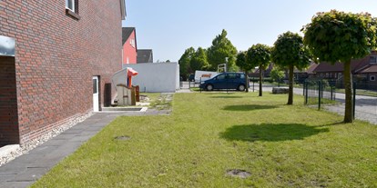 Rollstuhlgerechte Unterkunft - Unterkunftsart: Ferienwohnung - Padingbüttel - Gemeinschaftsgarte - Urlaubsziel Hooksiel - Barrierearm