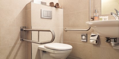 Rollstuhlgerechte Unterkunft - PLZ 78532 (Deutschland) - Toilette mit Haltegriff - Ferienhotel Bodensee, Stiftung Pro Handicap