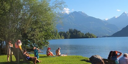 Rollstuhlgerechte Unterkunft - Maishofener Freibad am See gratis für Gäste - Villa Mandl bei Zell am See Pool Sauna Hunde erl. Rollstuhlgängig