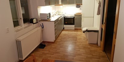 Rollstuhlgerechte Unterkunft - Süd-Lappland - Both apartments have fully-equipped kitchens and dining areas. - The Friendly Moose Lapland