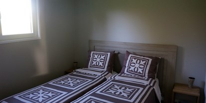 Rollstuhlgerechte Unterkunft - Schlafzimmer mit Doppelbett - Rollstuhl-Urlaub in Zeeland "Paul Kaiser"