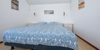 Rollstuhlgerechte Unterkunft - Doppelbett - Modestia Groepsverblijf Texel