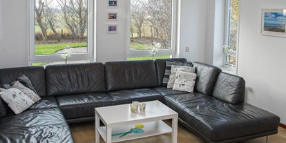 Rollstuhlgerechte Unterkunft - Gemütliche Couch - Modestia Groepsverblijf Texel