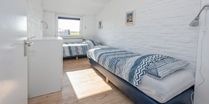 Rollstuhlgerechte Unterkunft - Doppelzimmer mit Einzelbetten - Modestia Groepsverblijf Texel