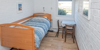 Rollstuhlgerechte Unterkunft - Weiteres elektrisch verstellbares Pflegebett - Modestia Groepsverblijf Texel