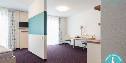 Rollstuhlgerechte Unterkunft - Oberbayern - Geräumiges Doppelzimmer für Rollstuhlfahrer - 100 % barrierefreies Hotel Lichtblick in Münchner Umgebung