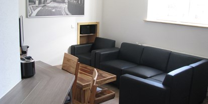 Rollstuhlgerechte Unterkunft - Wohnzimmer - Ferienwohnung Boßmann