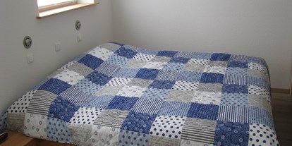 Rollstuhlgerechte Unterkunft - Unterkunftsart: Ferienwohnung - Niedersachsen - Schlafzimmer - Ferienwohnung Boßmann
