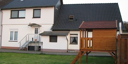 Rollstuhlgerechte Unterkunft - Unterkunftsart: Ferienwohnung - PLZ 31515 (Deutschland) - Aussenbereich - Ferienwohnung Boßmann