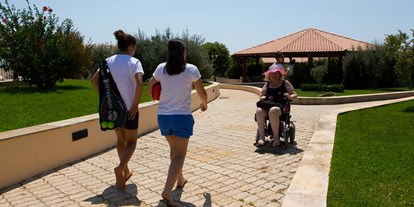 Rollstuhlgerechte Unterkunft - Pflegebett - Kikki Village Resort