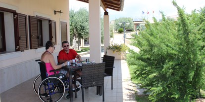 Rollstuhlgerechte Unterkunft - Kikki Village Resort