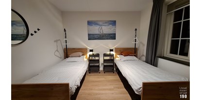 Rollstuhlgerechte Unterkunft - See - Niederlande - Die Betten können auseinander geschoben und auch um eine Vierteldrehung gedreht werden. - IJsselmeerstraat190