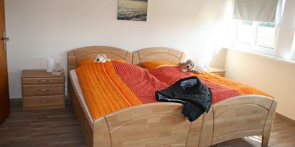 Rollstuhlgerechte Unterkunft - Unterkunftsart: Ferienhaus - Salzbergen - 1. Schlafzimmer in der Oberwohnung - Landhaus Ehren