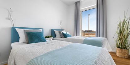 Rollstuhlgerechte Unterkunft - Meer - Schwartbuck - Schlafzimmer mit zwei Einzelbetten - Ocean Terrace 