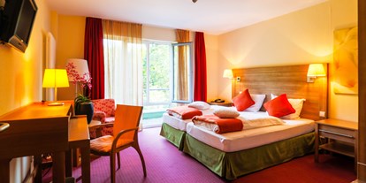 Rollstuhlgerechte Unterkunft - Unterkunftsart: Hotel - Baden-Württemberg - Barrierefreies Zimmer mit TV - Nashira Kurpark Hotel****