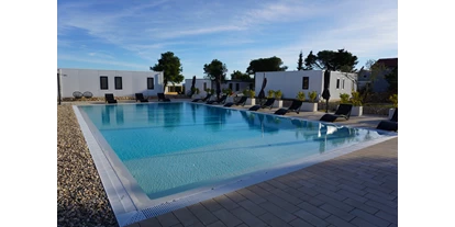 Rollstuhlgerechte Unterkunft - Unterkunftsart: Ferienhaus - Casa Mia *barrierefrei* Holiday Village 12