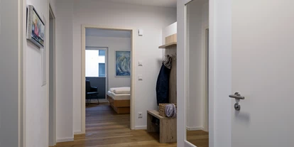 Rollstuhlgerechte Unterkunft - Pflegebett - Flur - SP 3 FW Eastside App. 3 Olpenitz