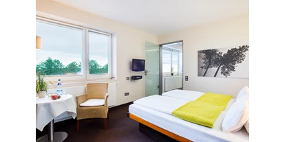 Rollstuhlgerechte Unterkunft - Pflegebett - Wohnbeispiel - Hotel Windschur
