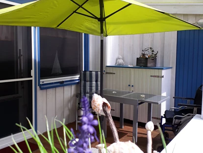 Rollstuhlgerechte Unterkunft - Unterkunftsart: Ferienhaus - Geräumige und überdachte Terrasse FeWo 1 - Ferienwohnungen "Käpt´n Udo"