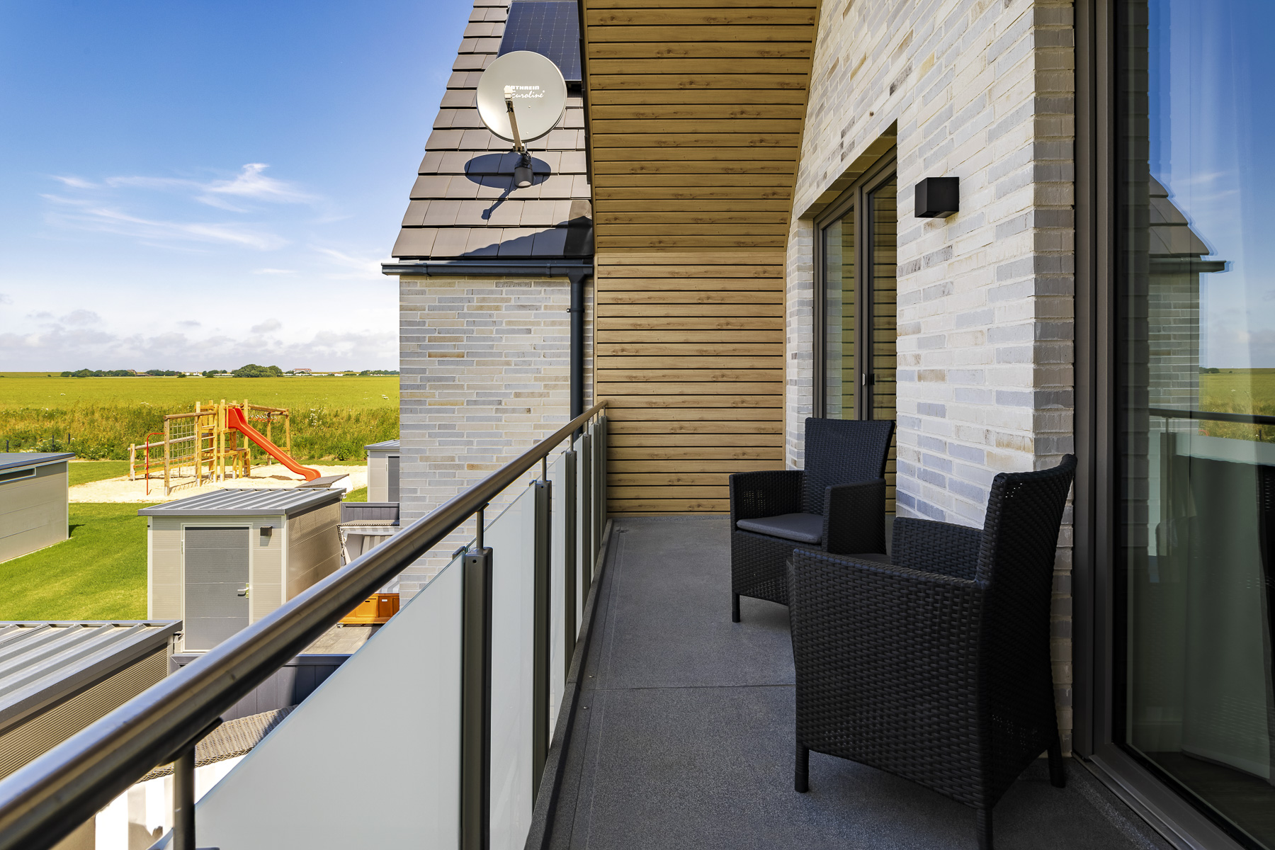 Rollstuhl-Urlaub: Loggia im OG - von beiden Schlafzimmern erreichbar - Haus Fichte