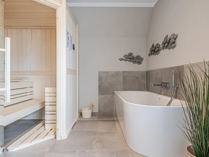 Rollstuhlgerechte Unterkunft - Unterkunftsart: Ferienhaus - Sauna und Badewanne - Korn-Koje