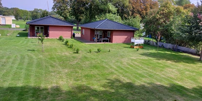 Rollstuhlgerechte Unterkunft - Unterkunftsart: Ferienhaus - Luftbild - Freistehender Bungalow im Poggenhof auf Insel Rügen