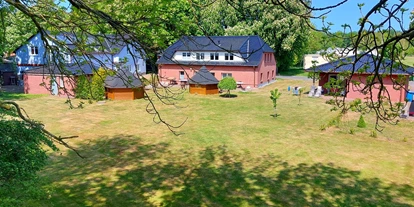 Rollstuhlgerechte Unterkunft - Unterkunftsart: Ferienhaus - Anwesen,
Gruppenhäuser für zu betreuende Gruppen, bis zu 40 Plätze - Freistehender Bungalow im Poggenhof auf Insel Rügen