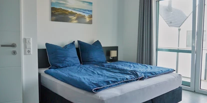 Rollstuhlgerechte Unterkunft - Unterkunftsart: Ferienhaus - Schlafzimmer 2 (OG) mit Doppelbett (180x200cm) - Ferienbude an den Wehlen
