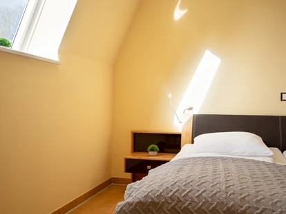 Rollstuhlgerechte Unterkunft - Schlafzimmer - Appartement Sorgenlos in Grömitz