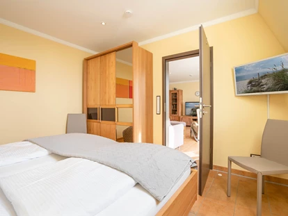 Rollstuhlgerechte Unterkunft - Schlafzimmer - Appartement Sorgenlos in Grömitz