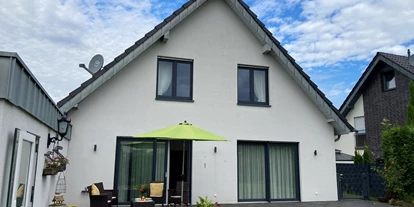 Rollstuhlgerechte Unterkunft - Unterkunftsart: Ferienhaus - Ansicht Gartenseite - Ferienhaus "Am Dombogen" Xanten