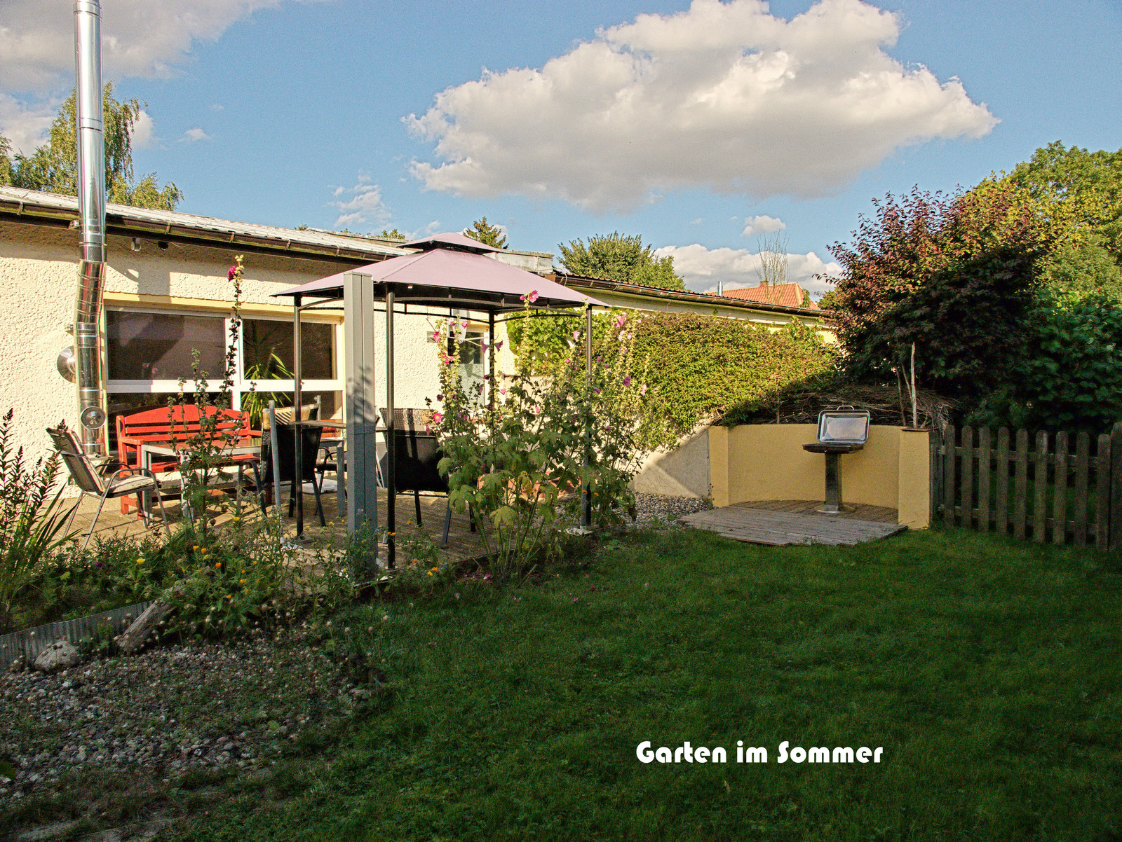Rollstuhl-Urlaub: Garten - Barrierefreie Ferienwohnung Godhans