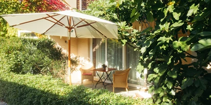 Rollstuhlgerechte Unterkunft - Unterkunftsart: Ferienhaus - Veranda Gartenhaus (überdacht) - Senhalser Höfe - Apartment Gartenhaus