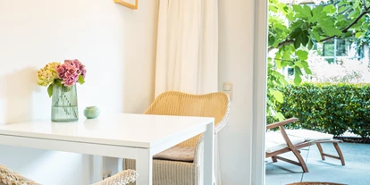 Rollstuhlgerechte Unterkunft - Unterkunftsart: Ferienhaus - Eingang Apartment Gartenhaus - Senhalser Höfe - Apartment Gartenhaus