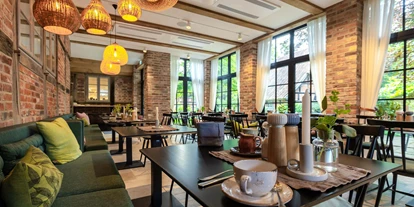 Rollstuhlgerechte Unterkunft - Pflegebett - Wintergarten - Biohotel Wildland