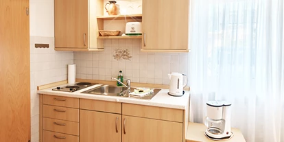 Rollstuhlgerechte Unterkunft - Pflegebett - Küchenzeile - Apartmenthaus Bad Bellingen