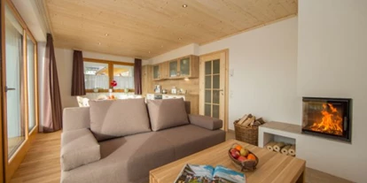 Rollstuhlgerechte Unterkunft - Unterkunftsart: Ferienhaus - EG Kamin - Villa Mandl bei Zell am See Pool Sauna Hunde erl. Rollstuhlgängig
