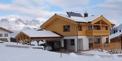 Rollstuhlgerechte Unterkunft - Unterkunftsart: Ferienhaus - Winter - Villa Mandl bei Zell am See Pool Sauna Hunde erl. Rollstuhlgängig