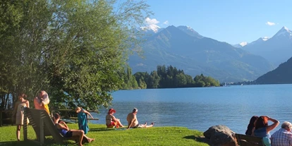 Rollstuhlgerechte Unterkunft - Unterkunftsart: Ferienhaus - Maishofener Freibad am See gratis für Gäste - Villa Mandl bei Zell am See Pool Sauna Hunde erl. Rollstuhlgängig