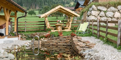 Rollstuhlgerechte Unterkunft - Unterkunftsart: Ferienhaus - Grillpavillon mit Schwimmteich - Villa Mandl bei Zell am See Pool Sauna Hunde erl. Rollstuhlgängig