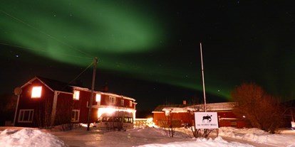 Rollstuhlgerechte Unterkunft - Unterkunftsart: Gästehaus - Schweden - The beautiful Northern Lights over The Friendly Mose - The Friendly Moose Lapland