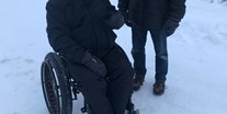 Rollstuhlgerechte Unterkunft - Nordschweden - The "Wheelblades" attached to front wheels help you move through the snow - The Friendly Moose Lapland