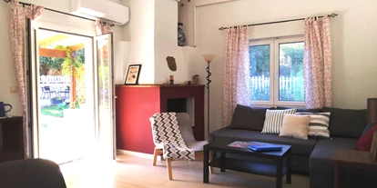 Rollstuhlgerechte Unterkunft - Unterkunftsart: Ferienhaus - Wohnbereich von Joleni Cottage - Joleni Cottage