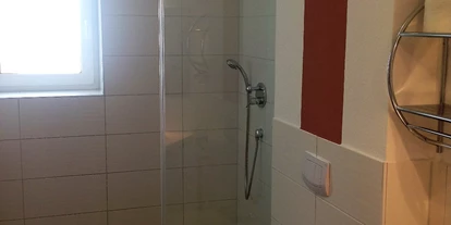 Rollstuhlgerechte Unterkunft - Unterkunftsart: Ferienhaus - Ebenerdige befahrbare Dusche - Ferienwohnung BellaVita