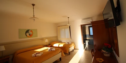 Rollstuhlgerechte Unterkunft - Pflegebett - Kikki Village Resort