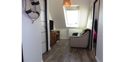 Rollstuhlgerechte Unterkunft - Unterkunftsart: Ferienhaus - 2. TV-Ecke mit TV mit deutschen Sendern und Wii-Spielkonsole - Ferienhaus Bretagne - Plouarzel