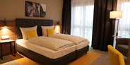 Rollstuhlgerechte Unterkunft - Pflegebett - Doppelzimmer Comfort - Hotel INCLUDiO 