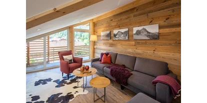 Rollstuhlgerechte Unterkunft - Pflegebett - Alpiner Lebensstil im gemütlichen Wohnzimmer - Rollstuhlgerechte Ferienwohnung in Pfronten