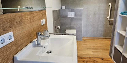 Rollstuhlgerechte Unterkunft - Unterkunftsart: Ferienhaus - Erdhausapartment OST
